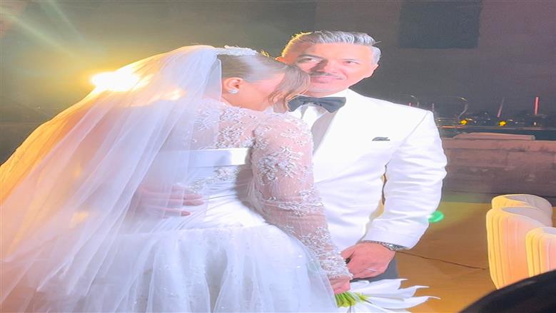 هايدي موسى وزوجها محمد غانم<br> 