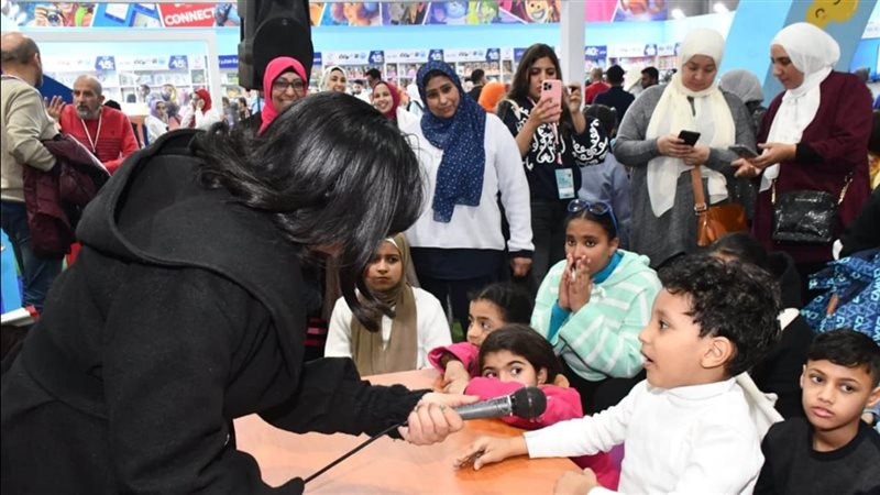 الأطفال بمعرض الكتاب