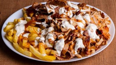 مائدة إفطار 10 رمضان.. طريقة تحضير فتة الشاورما بألذ طعم 